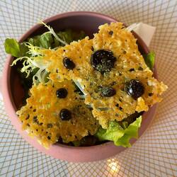 Salad with parm cracker and balsamic vinegar
