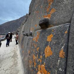 The knobs were to heft the rocks up with wooden levers.