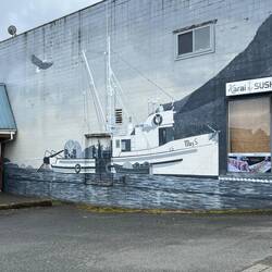 Mural on the side of a building.