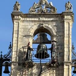 The figures actually move to "bang" the bell with each chime.