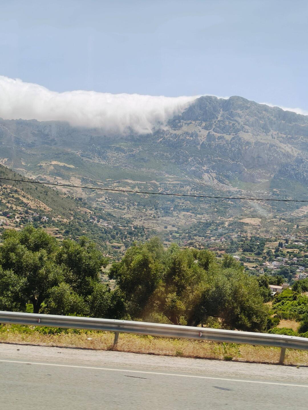 Clouds rolling down over the hills heading to chefchaouen