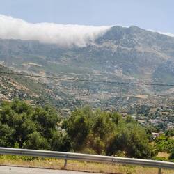 Clouds rolling down over the hills heading to chefchaouen