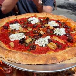 Caper olive pizza