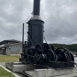Next to Port McNeill Harbor office and welcome center. Some kind of log winch maybe?