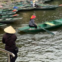 We sat at Bến thuyền Thung Nắng to watch the sampan rowing boats.