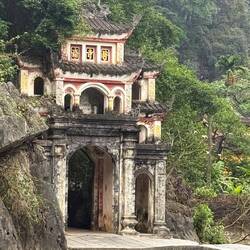 Bich Dong Pagoda entranceway to a 15th-century temple built directly into the cliffside