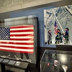 The Flag 🇺🇸 hoisted by responders, on the rubble