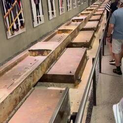 A line of actual beam spots. Took a day to cut each one.