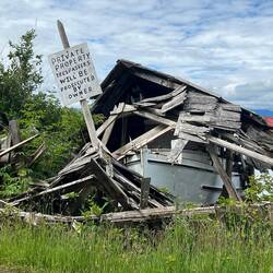 I wonder what shape the boat inside this shed is?