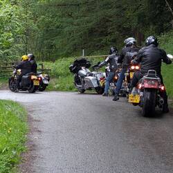 Harley riders discussing ford