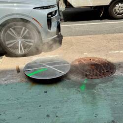 Heat rising from manholes above Subway