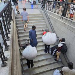 Vendors with bags play hike & seek with the police