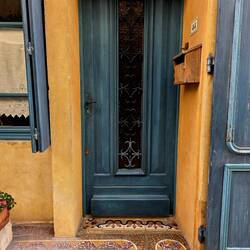 Colorful doorway in the walled hilltop village of Ménerbes