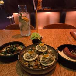 From left to right, mushrooms, trout on prawn crackers and venison tongue with horse radish & gravy