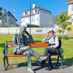 Two Poets seated by The Pond