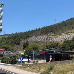 Truck stop/hotel, plus many, many solar panels. Many big-rigs parked across the street.