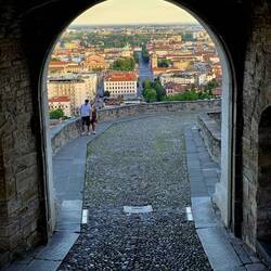 View of Lower Town Bergamo from an old Town entrance gate.