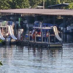 Party barge rental. Lots of music, beer, water, fun in the sun.