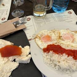 Cheese with quince jelly; eggs and rice with tomatoes. Pretty much tasted as bland as it looks.