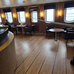 Ropes strung up to hold on to - the rule is keep one hand for yourself and one for the ship