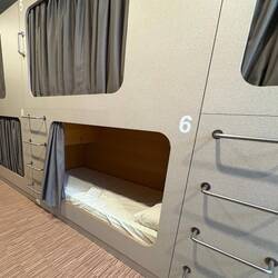 Tonight's bed. Has a plug, a light, and a lockable cabinet.