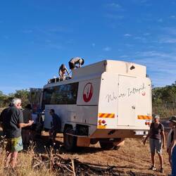 Collecting fire wood from the roadside before entering the NP. Strapped down on the roof top.