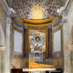 In the apse is the Francesco Fabbri harpsichord (c. 1630-1650) — Museo San Colombano, Bologna.