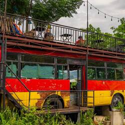 The bus is part of the café at the end of the loop, overlooking Ha Giang City.