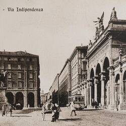 Archival photo of Arena del Sole on the right; statue of Garibaldi on the left — Bologna, Italy.