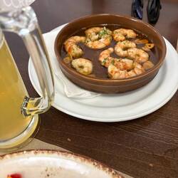 Garlic prawns. I didn't have any but dipped plenty of bread in the oil.