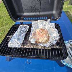 Supper is a bacon wrapped chicken breast with cheese and asparagus and onion soup potatoes.