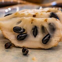 A custard apple - texture is like a really soft pear, and the flavour - like a pudding pear? :D
