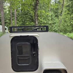 Roof rack mostly for resale. Handles inside and outdoors to ease entry and exit.