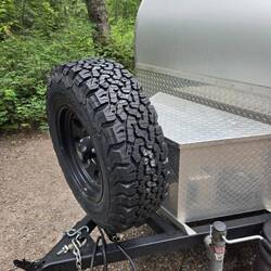 Tour of the camper...front tire and tool box