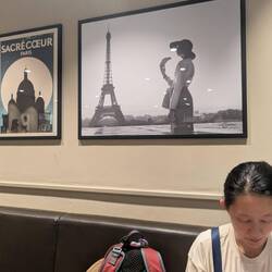A short domestic train to the fast train station. We camped out at the only place with seats.