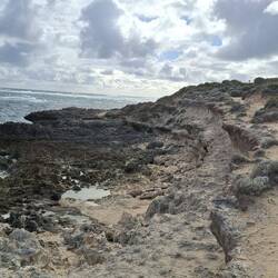 Wace erosion under the sandstone along the beach