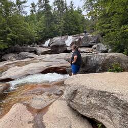 Kris is contemplating life and how she's gonna get back off of these rocks lol