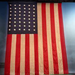 World War II-era 48 star U.S. Navy flag (8'x12'), used to be highly visible "battle flag" @ sea.