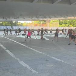 Aerobics class, under the bridge, in the park, and flood plain