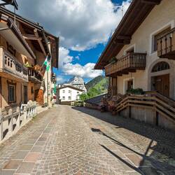 Residential street on the way up to the church — Colle Santa Lucia, Italy.