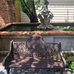 Love all the wrought iron furniture dotted around