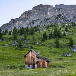 The mountains are dotted with refuge huts ... on the way up to Passo di Giau — Dolomiti, Italy.