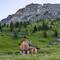 The mountains are dotted with refuge huts ... on the way up to Passo di Giau — Dolomiti, Italy.