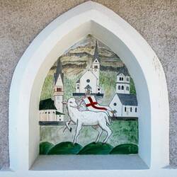 A small mural on the side of a votive shrine at the Belvedere Overlook.