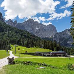 At the end of the first ride; the next cableway station is ahead of us — Civetta Ski Area.