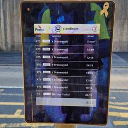 First time I have seen one of these small bus departure boards. Mounted on a lamp post, for power?