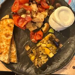 Panzanella (bread salad) with veggies and ricotta