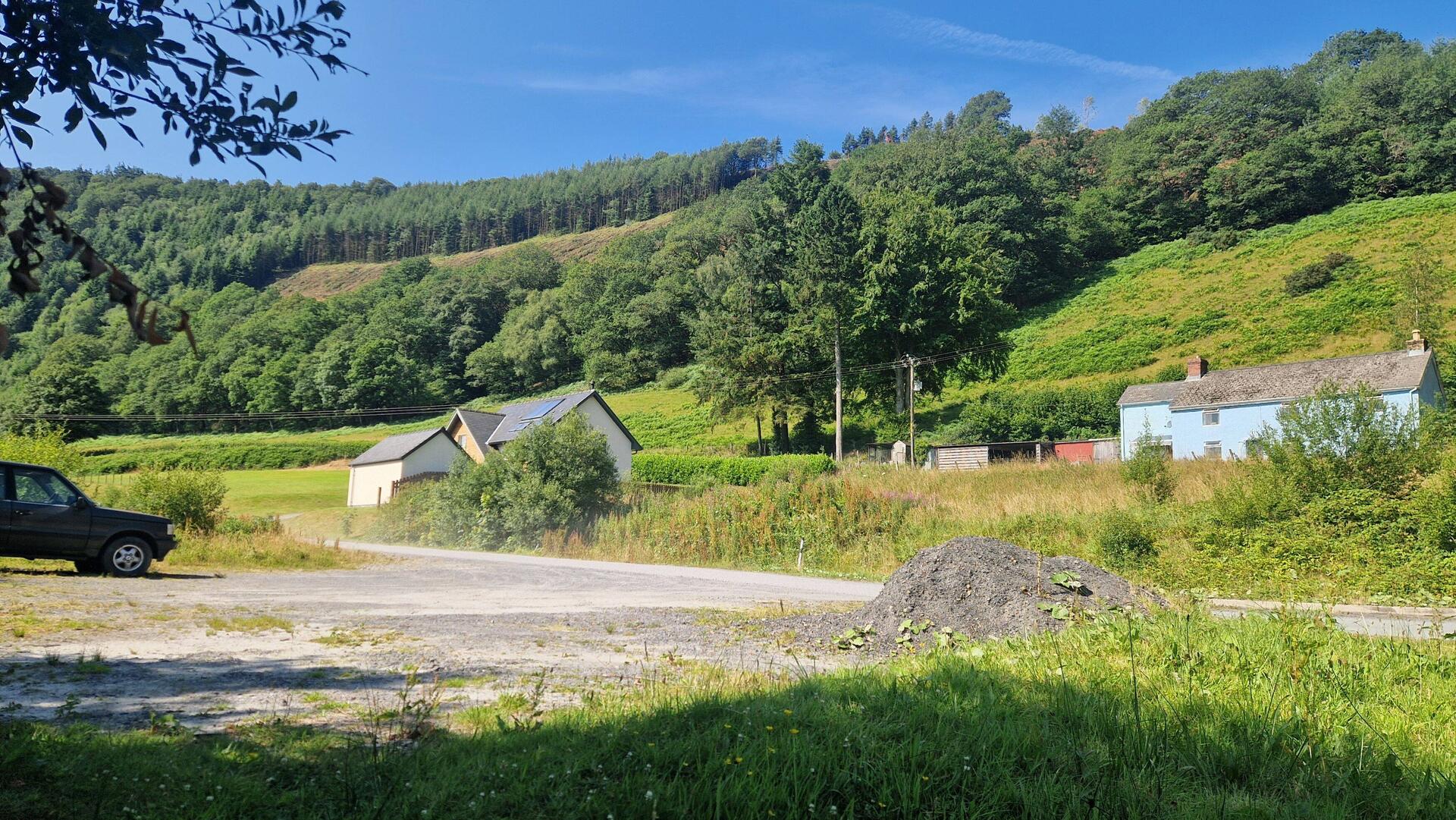 View from my patch of grass looking south at the next hill I have to climb.
