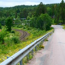 When they cannot fit the walking trail between the hill, the road and the railway, walk on the road.