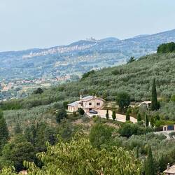 That's Assisi on the side of the mountain in the distance